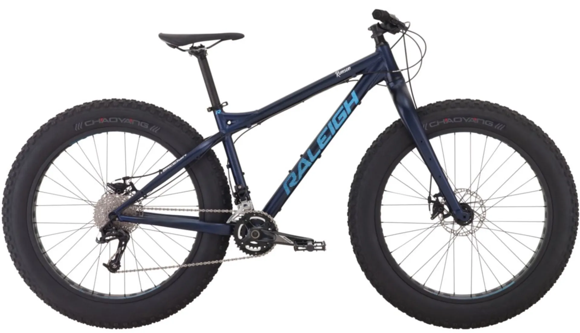 A blue bicycle with large tires