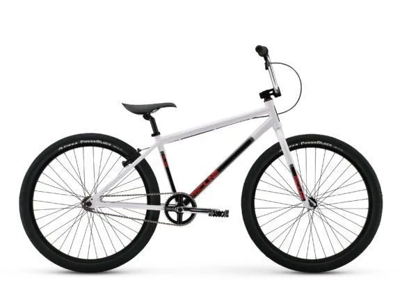 A white BMX bike with black tires